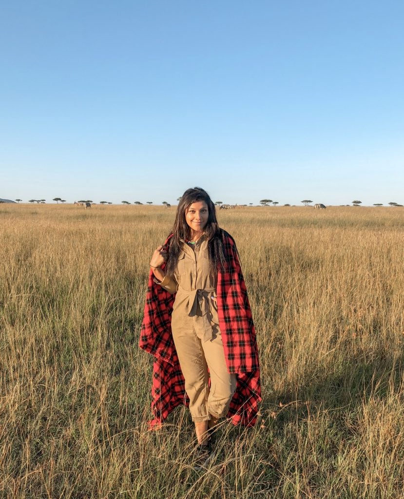 Bonnie Rakhit at Faitmont Masai mara in the traditional mara check blanket