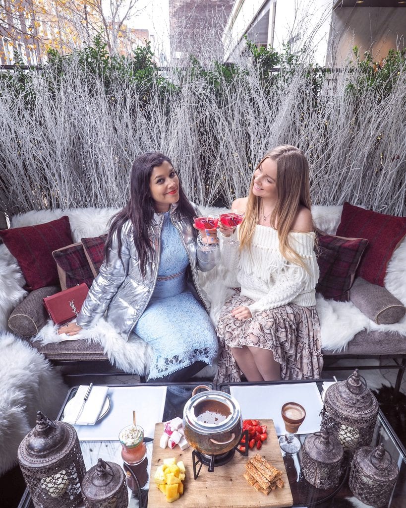 Bonnie Rakhit London Christmas Locations Churchill's bar terrace The blonde flamingo