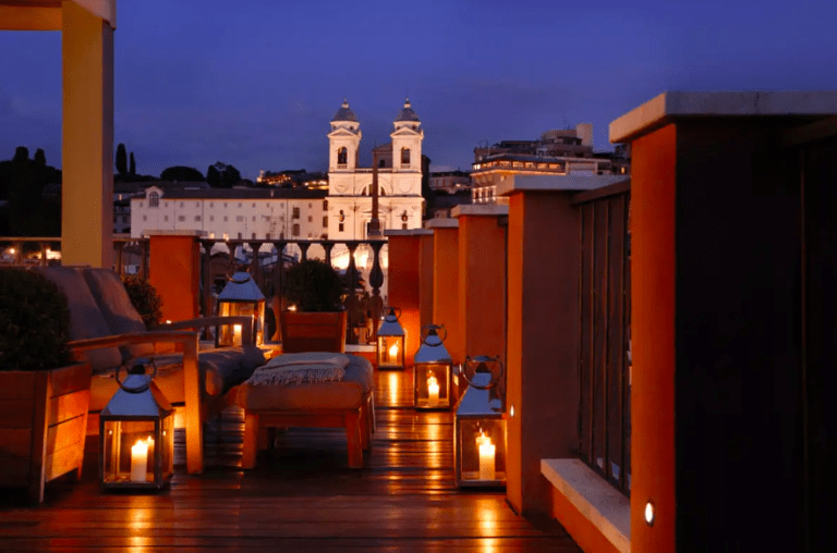 Rome's Most Stylish Italian Town House Hotel - Portrait Roma suite terrace at night